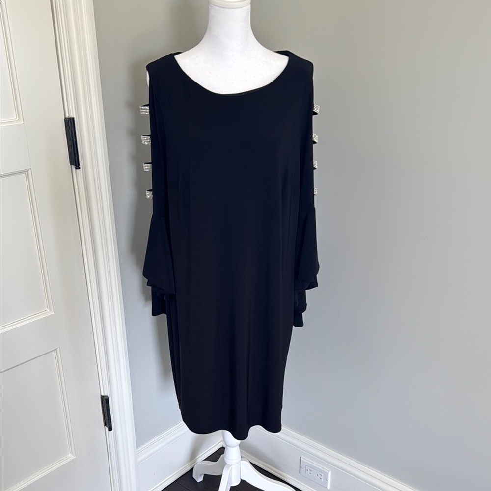 Elegant Black Dress with Unique Sleeve Detailing
